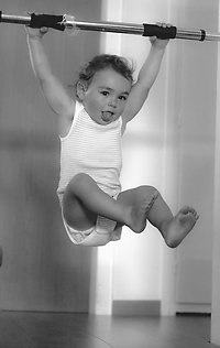 Movement. Hanging small child